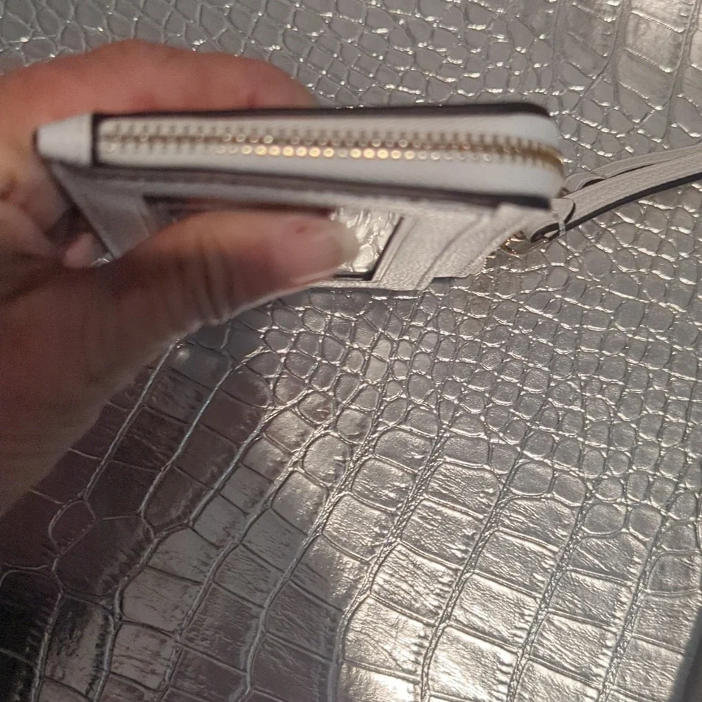Kate Spade small cardholder wristlet with extendable strap